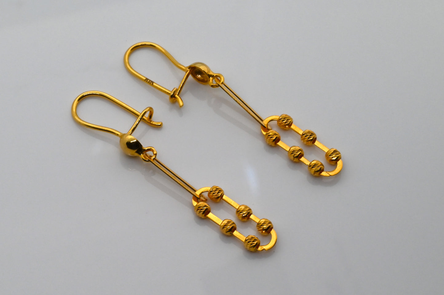 21k Dangling Gold Earrings